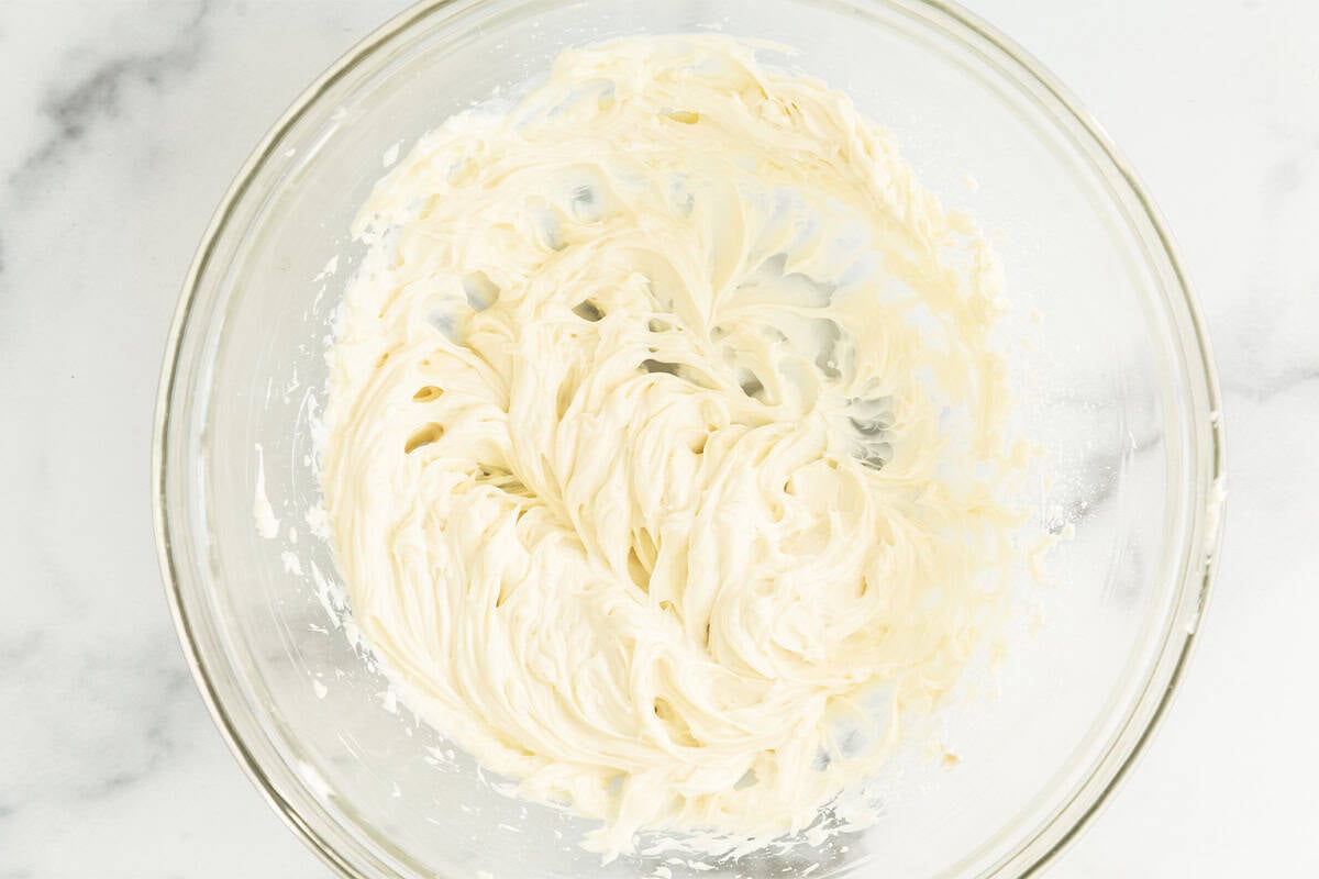 Cream cheese frosting in bowl.