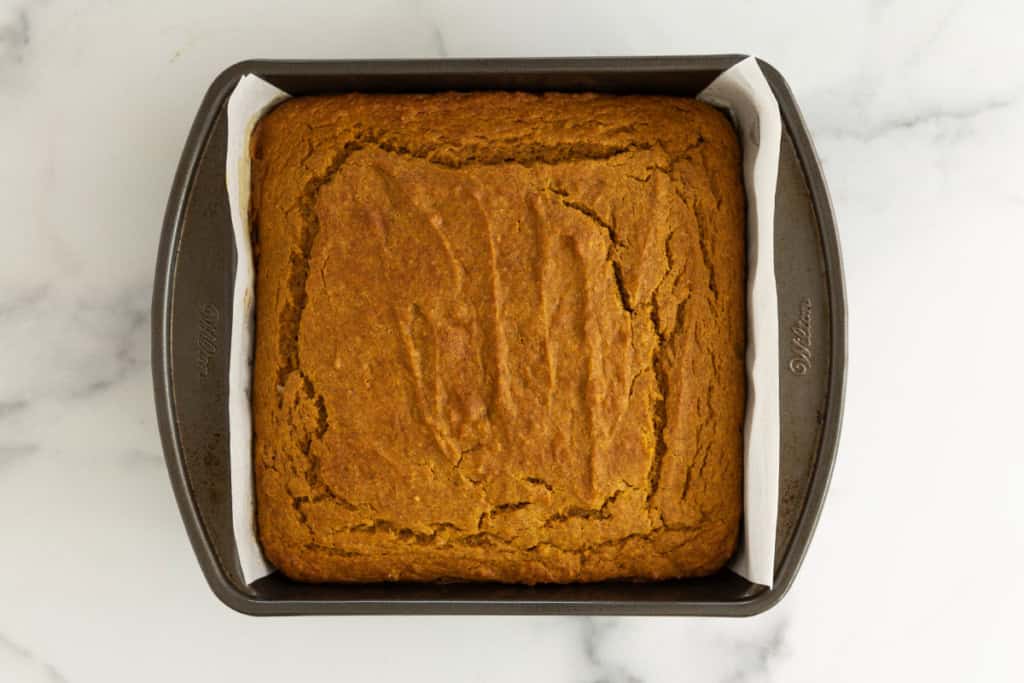 Pumpkin cake in pan after baking.