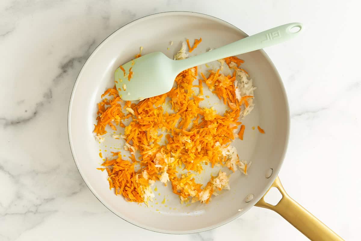 Carrots in frying pan for sloppy joes.