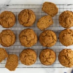 Pumpkin banana muffins on cooling rack.