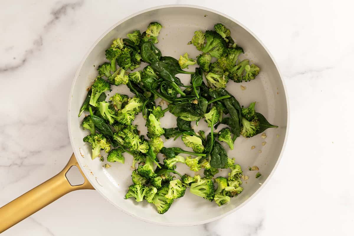 Broccoli in frying pan for halloween pasta.