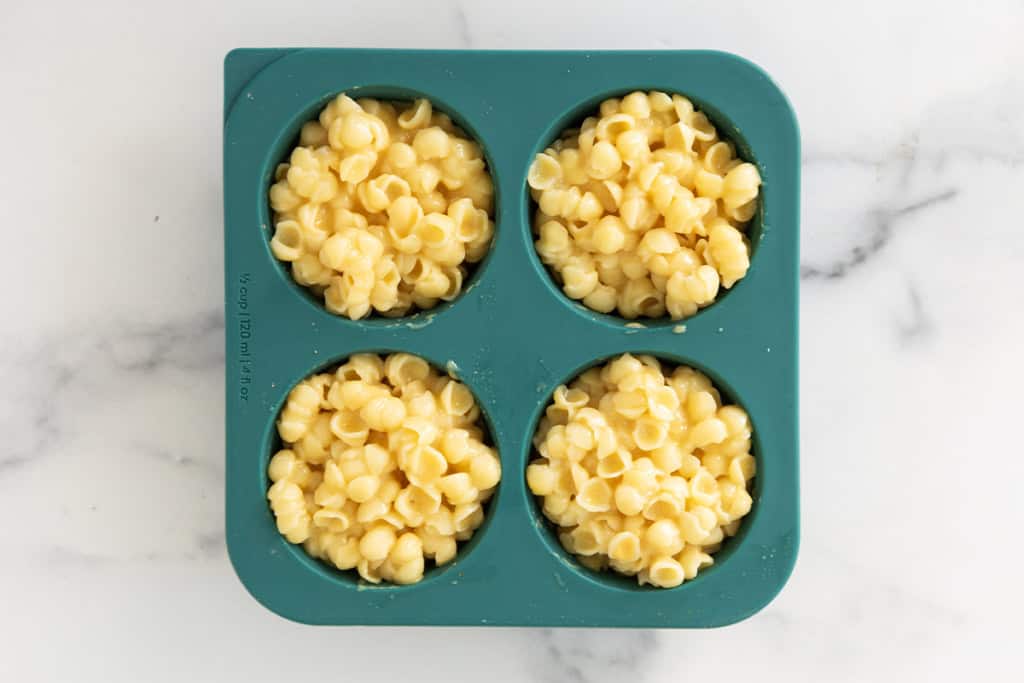 Mac and cheese in silicon freezer mold.