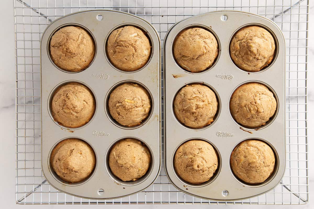 Pear muffins in muffin pan after baking.