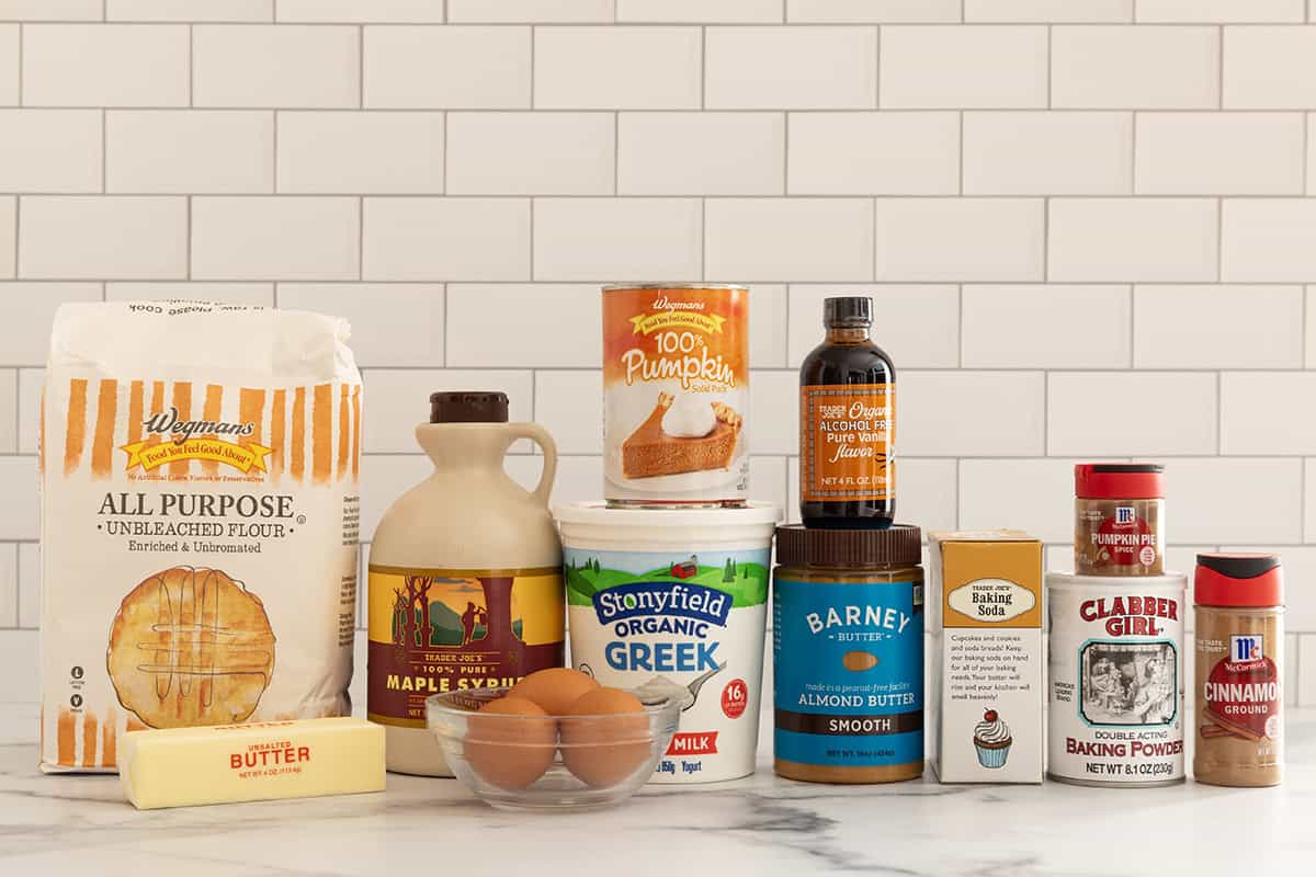 Ingredients for pumpkin protein muffins on countertop.