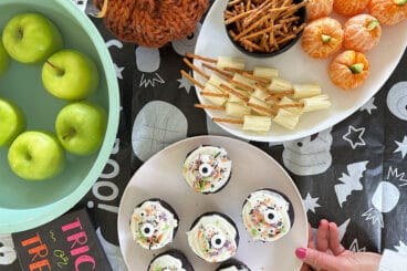 halloween foods on tablecloth.