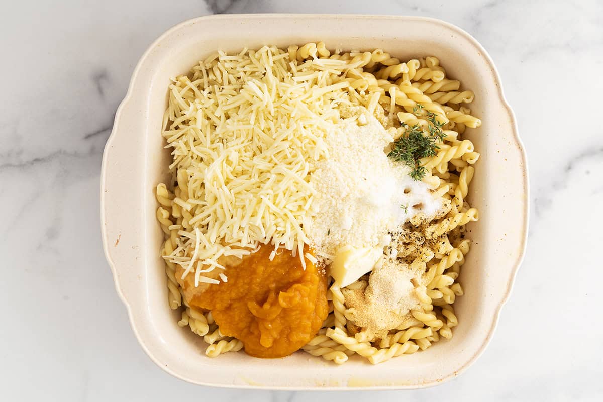 ingredients for butternut squash pasta bake in baking dish.