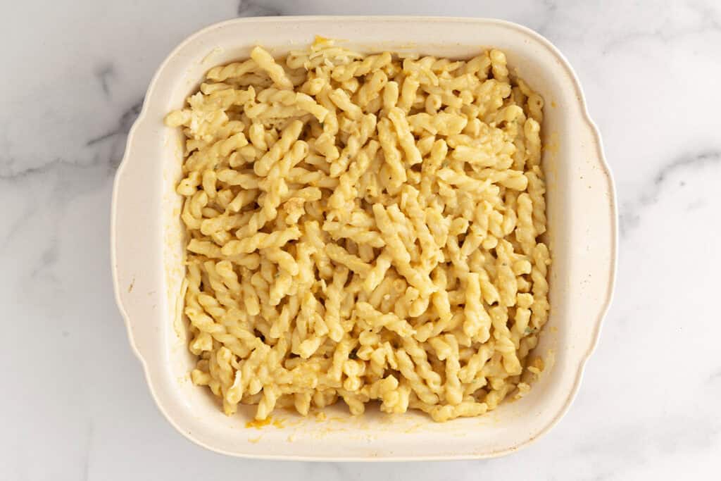 pasta with butternut squash sauce in baking dish.