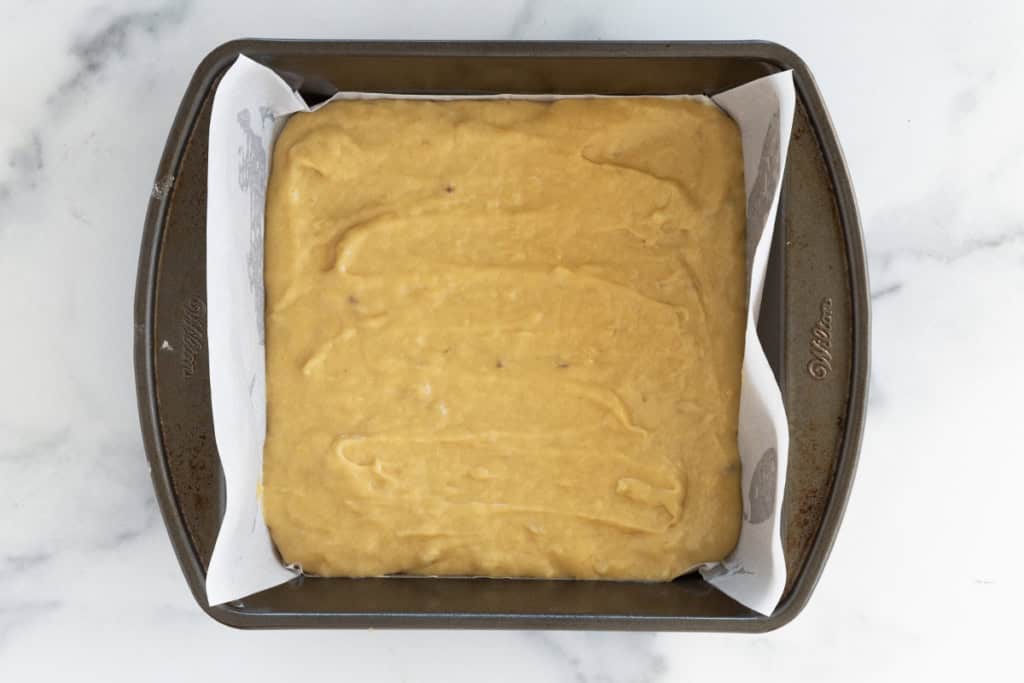 Banana blondies in baking pan before baking.