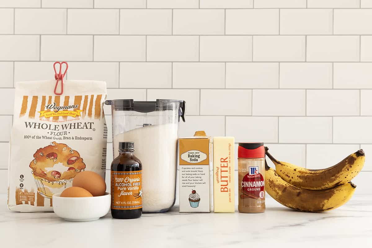 Ingredients for banana bread muffins on countertop. 