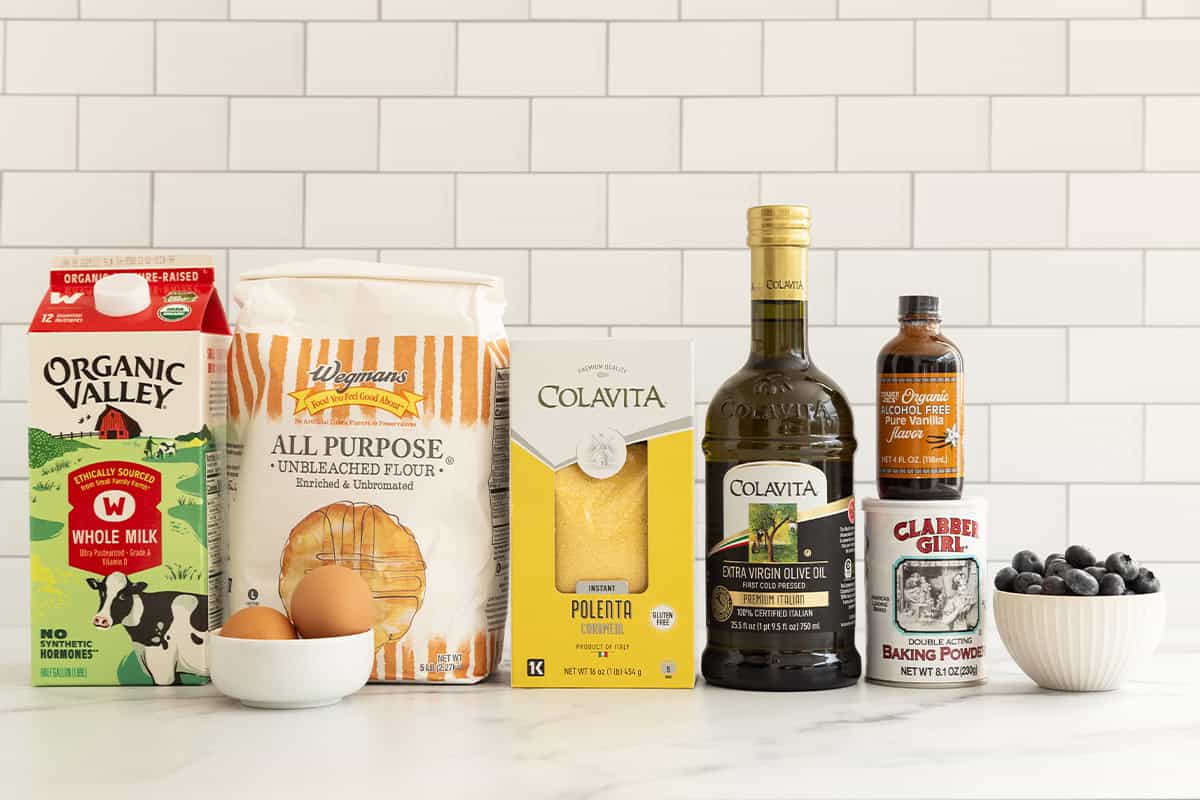 Ingredients for cornmeal pancakes on countertop.