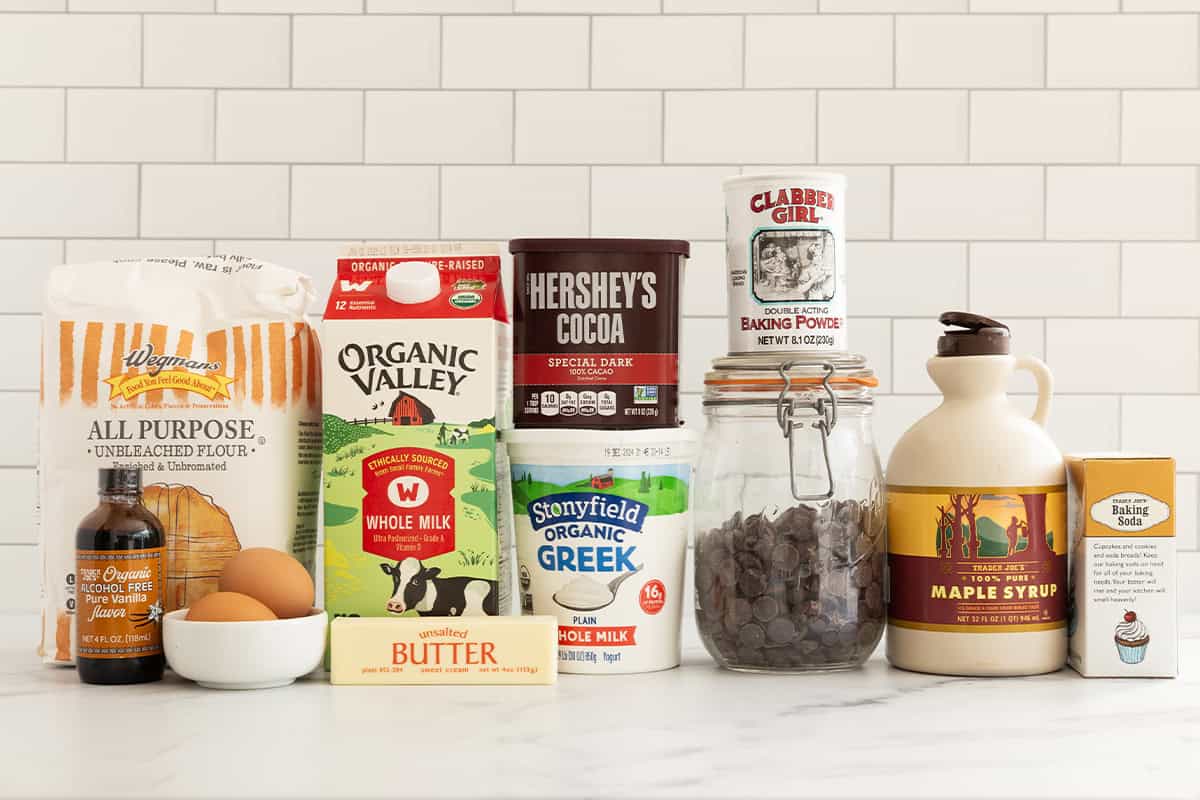 Ingredients for double chocolate muffins on countertop.