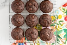 Double chocolate muffins on cooling rack.