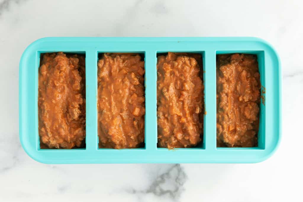 baby bolognese in freezer container.