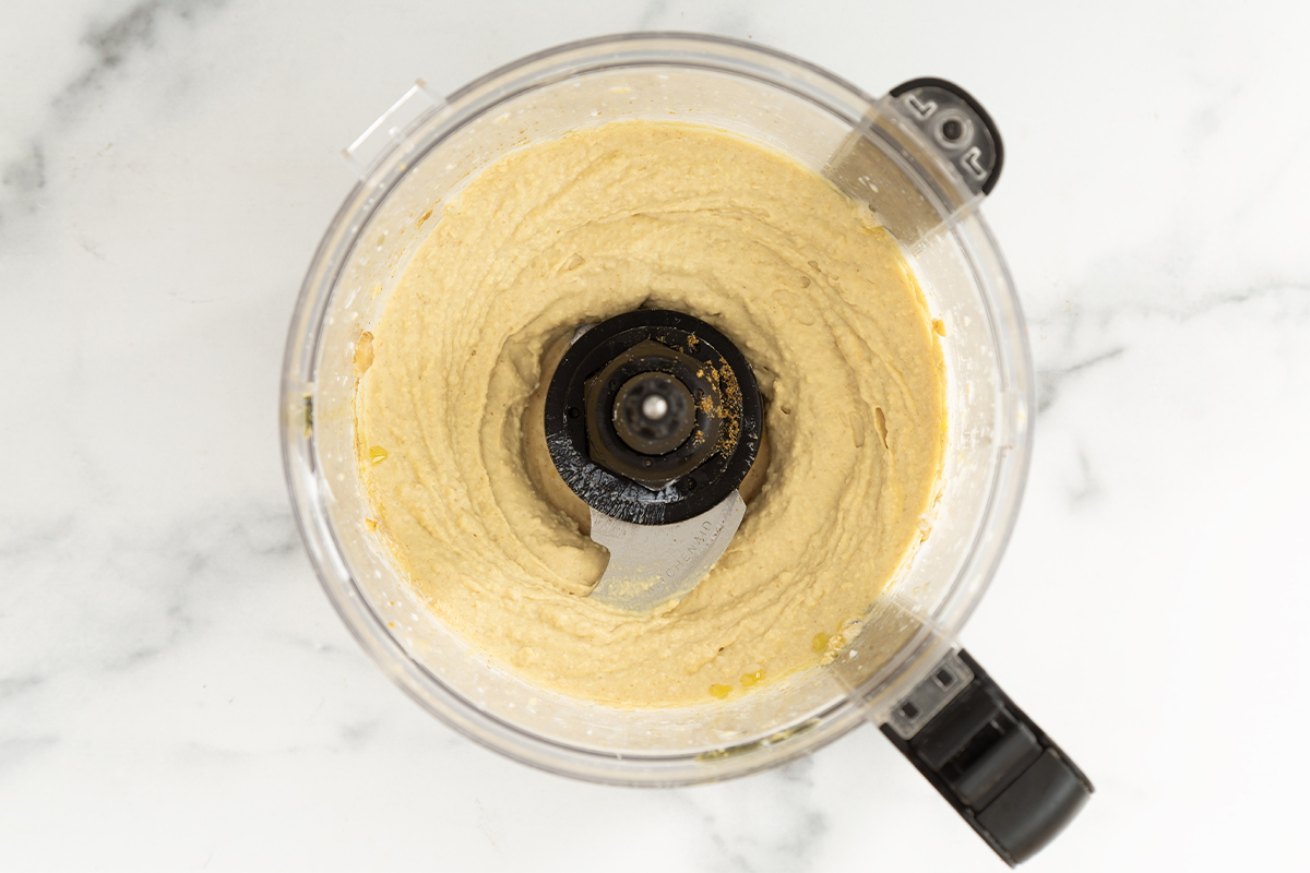 Baby hummus in food processor.