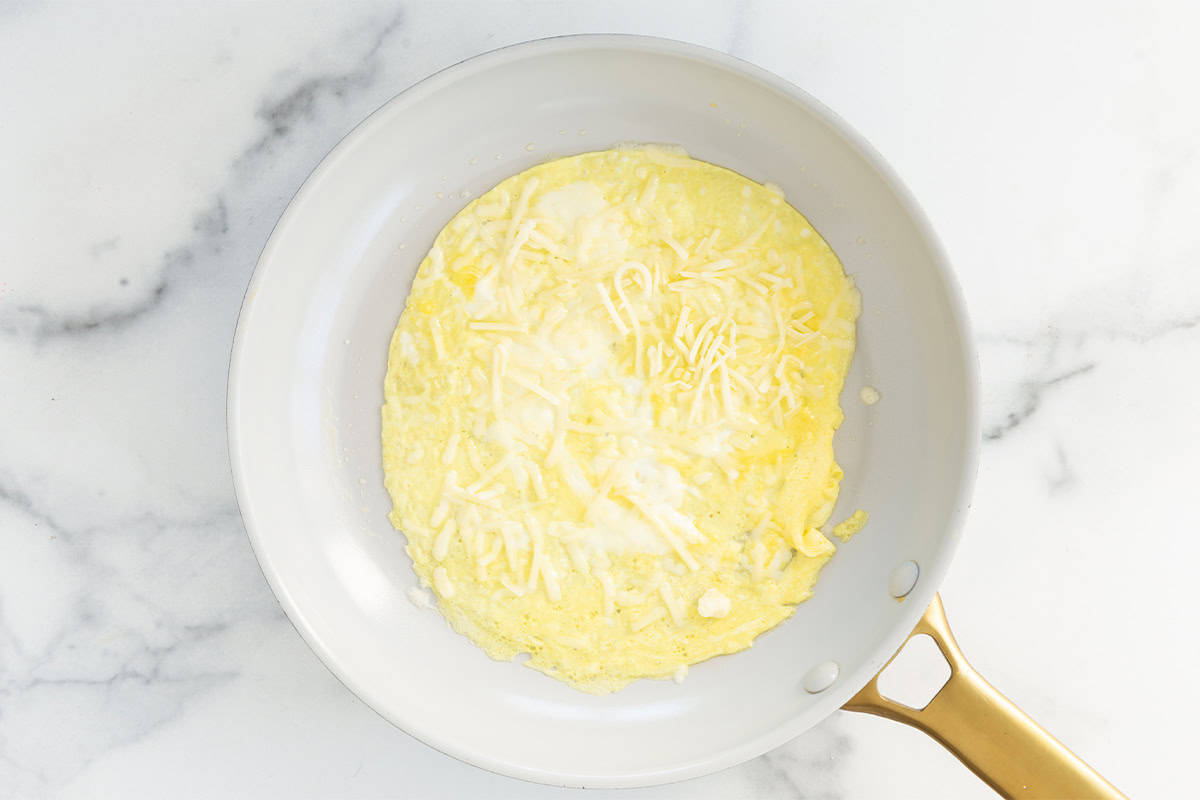 Baby omelette in pan.