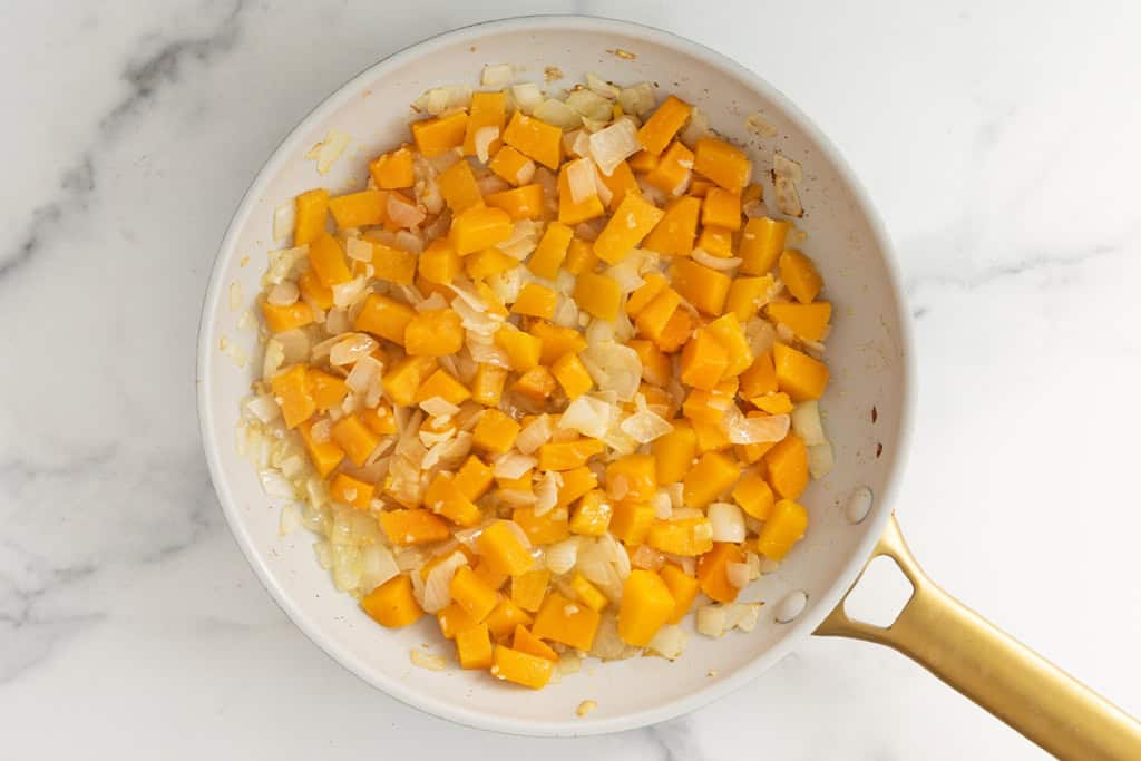 Ingredients in pan for butternut pasta sauce.