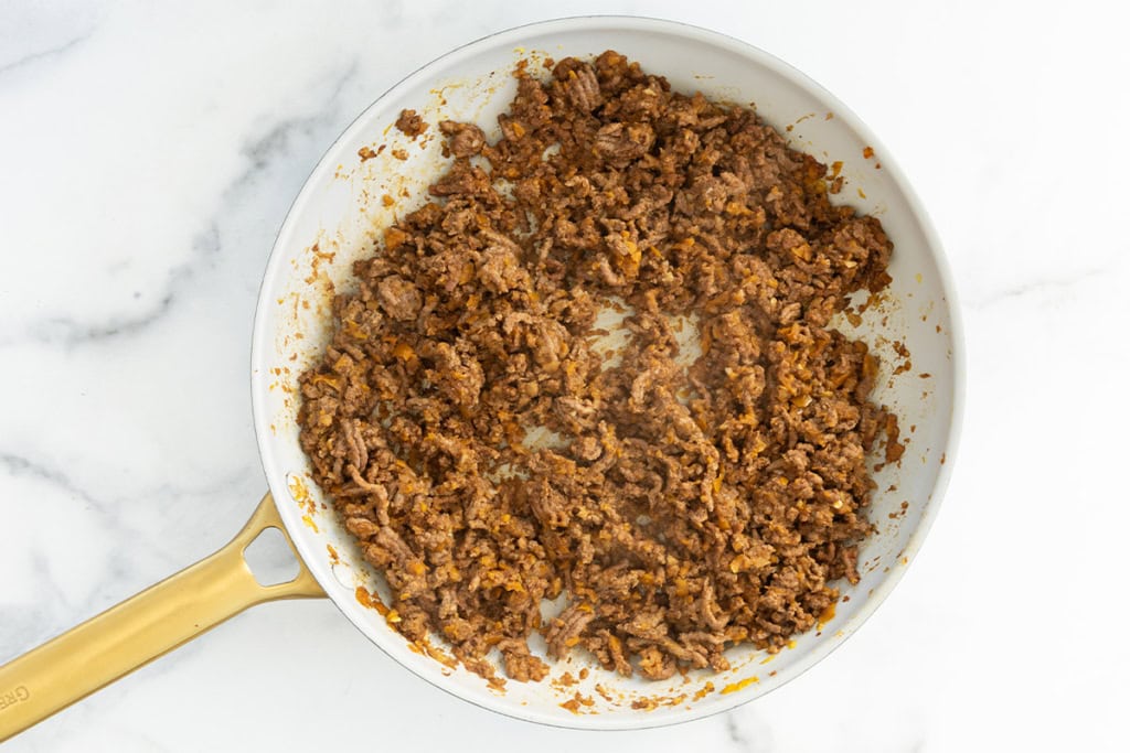 Taco meat in pan.