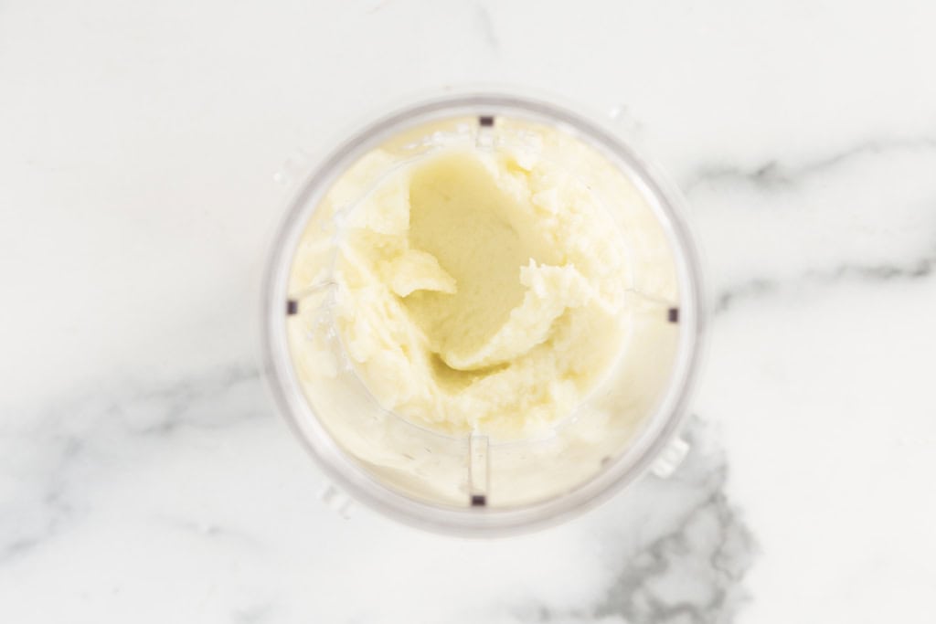 Cauliflower baby puree in food processor.