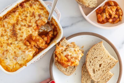 Pizza beans in casserole dish and on plate.