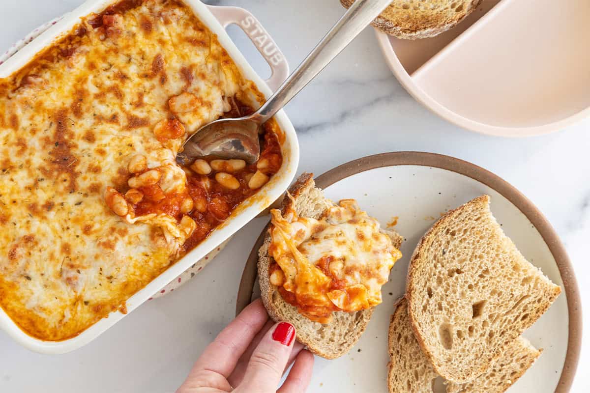 Pizza beans in casserole dish and on plate.